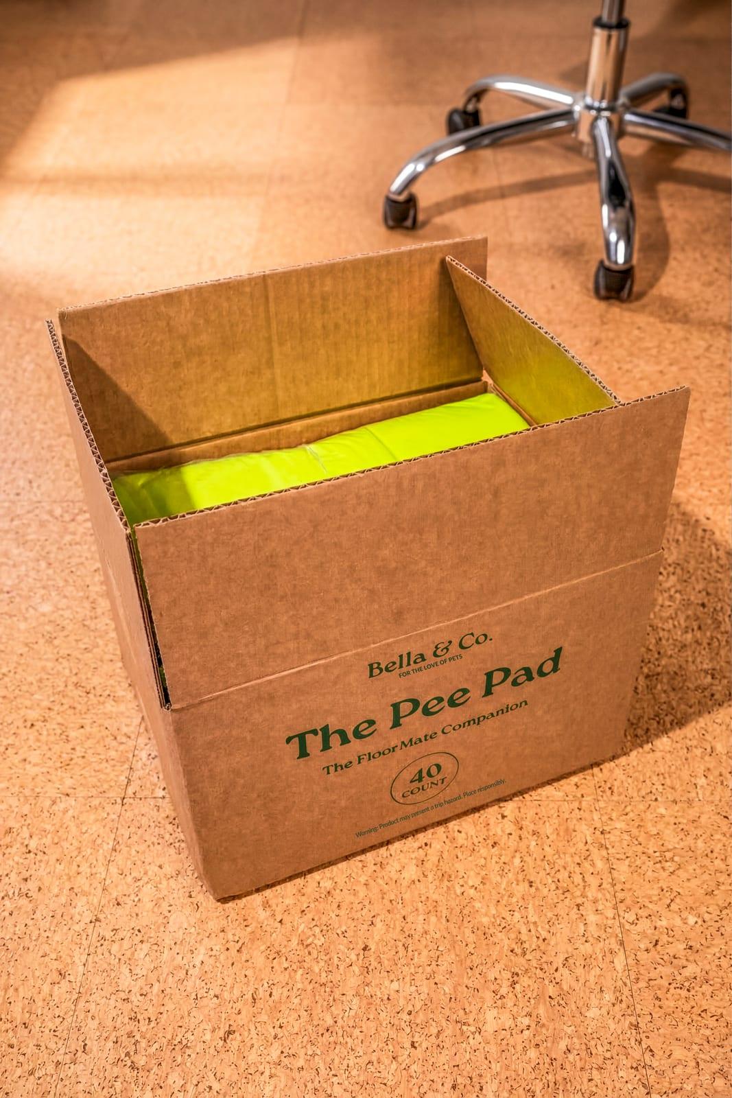 An open 40-count box of Pee Pads, stocked for the week